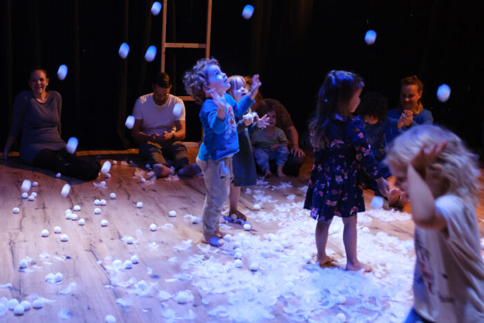 Children play with snow during the workshow